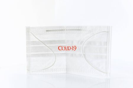 One white face mask on a white background, close up, isolatedの写真素材