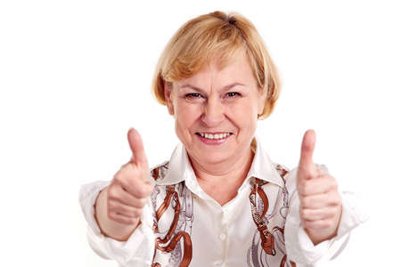 Happy mature woman showing thumbs up sign
