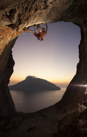 Rock climber at sunset  Kalymnos Island, Greece の写真素材