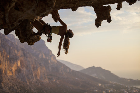 Rock climber at sunset, Kalymnos Island, Greeceの写真素材