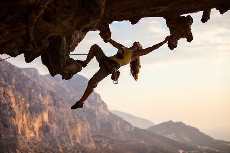 Rock climber at sunset, Kalymnos Island, Greece Rock climber at sunset, Kalymnos Island, Greece