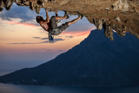 Rock climber at sunset, Kalymnos Island, Greeceの写真素材