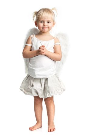 Cute little girl with angel wings over whiteの写真素材