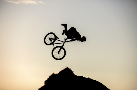 Extreme rider making a bike jumpの写真素材
