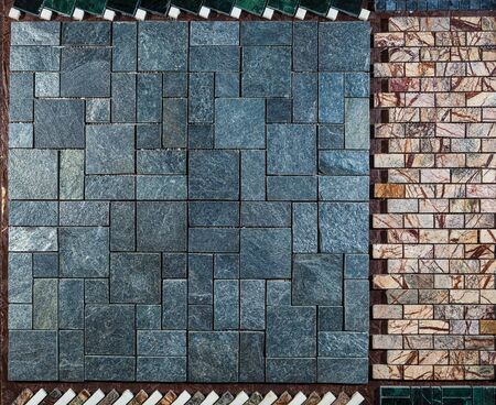 Marble wall or floor made of different types of tiles