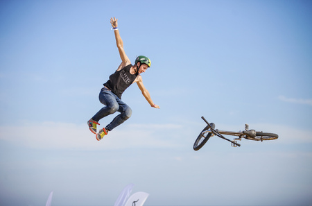 Extreme rider making a bike jump during the BMX Competitionのeditorial素材