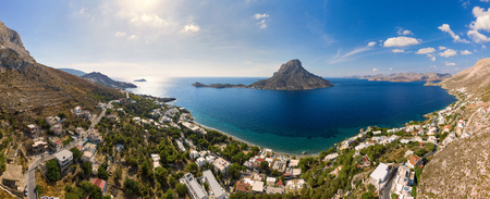 Panoramic landscape of Telendos island in distance and part of Kalymnos island, Massouri, Greece, bird's eye viewの写真素材