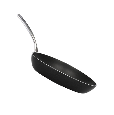 black frying pan isolated on white backgroundの写真素材