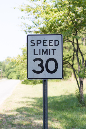 Speed limit sign on a country roadの写真素材