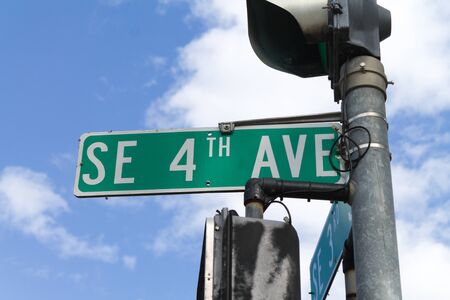 fourth avenue sign with the sky as the background.の写真素材