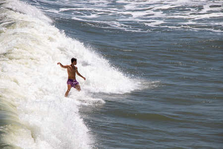 St. Augustine Surfers before a stormのeditorial素材