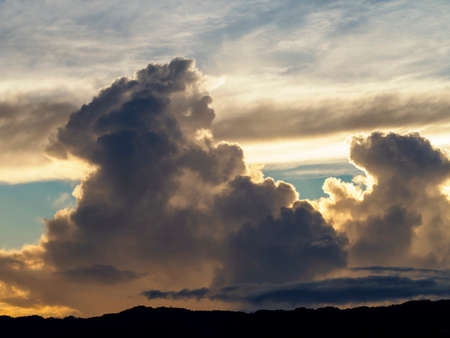 Sunrise sky and cumulonimbus cloudsの写真素材