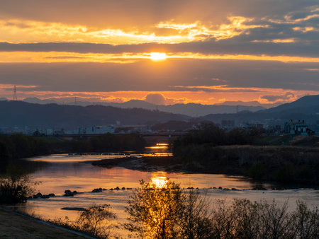 The first sunrise of Osaka seen from along the Yamato Riverの写真素材