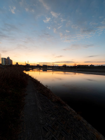 Scenery along the river with beautiful sunriseの写真素材
