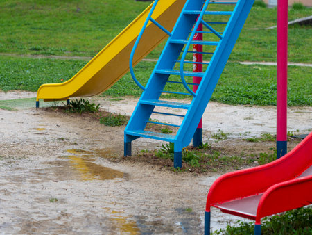 Scenery of a park filled with water due to rainの写真素材