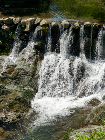 The weir of the Asuka River with clear waterの写真素材