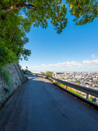 Mountain road and city viewの写真素材