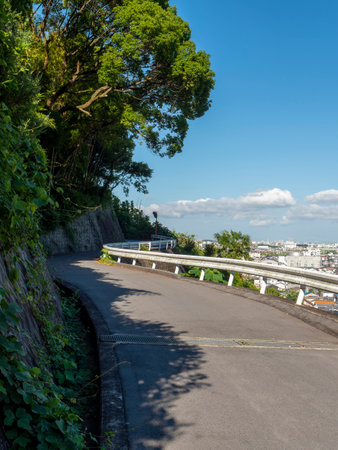 Mountain road and city viewの写真素材