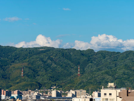 Osaka's cityscape and mountain sceneryの写真素材
