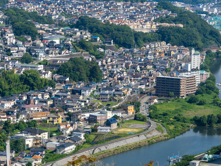 Streets along the river that flows along the prefectural borderの写真素材