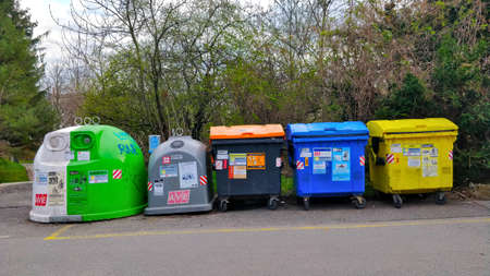 Dustbins for recyclable waste in Prague, Czech Republic. There is bin for white glass, colored...