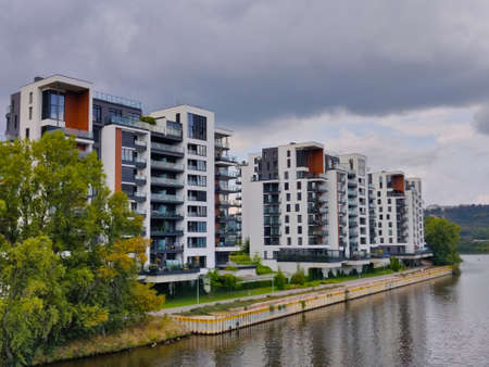 Prague, Czech Republic - September 12, 2021: Modern apartment building in newly built residential district in Prague Holesovice next to the Vltava river.のeditorial素材