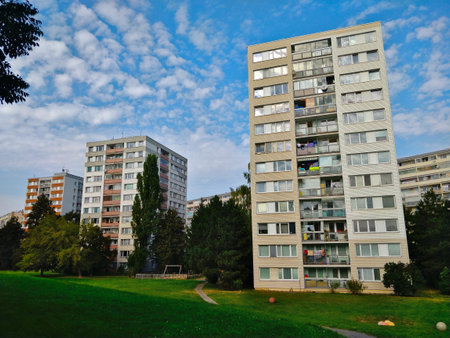 Prague, Czech Republic - September 26, 2021: Three tall old style block of flats in the grassy area of Prosek district in Prague.のeditorial素材