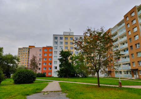Kladno, Czech Republic - September 19, 2021: Colorful block of flats district in Kladno with park in front of them.のeditorial素材