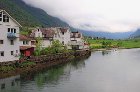Houses on river Oldeelva. Olden, Norwayのeditorial素材