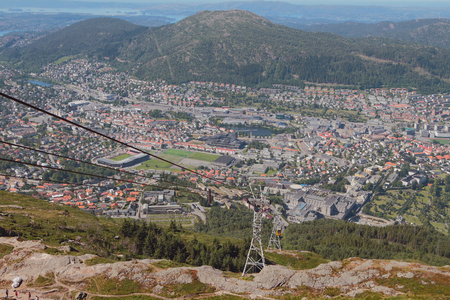 Ropeway Ulriksbanen and city at mountain foot. Bergen, Norwayの写真素材