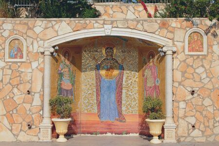 Painting mosaic on monastery walls. Agia Napa, Cyprusのeditorial素材