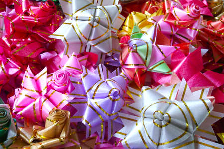 Set of six red ribbon satin bows isolated on whiteの写真素材