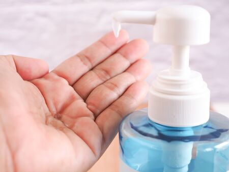 The alcohol gel in the bottle, hand cleanser pump kills some germs, bacteria, and viruses. Health concept.の写真素材