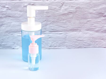 The alcohol gel and hand soap dispenser in the bottle pump on white background. Health concept.の写真素材