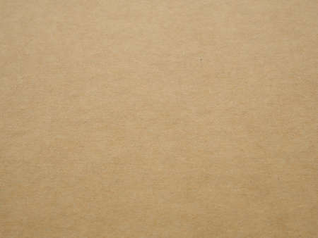 Empty brown cardboard paper background texture. Concept for image, text, design.の写真素材