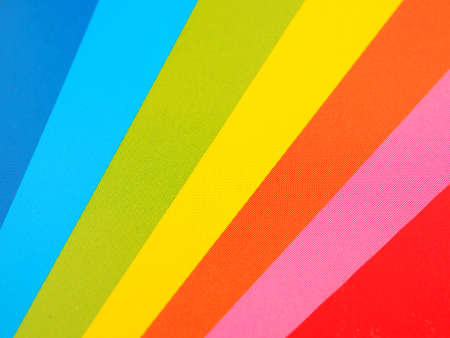 Sheets of multi colored paper for background and design.の写真素材