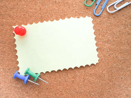 note pinned on a corkboard with pin for you text.