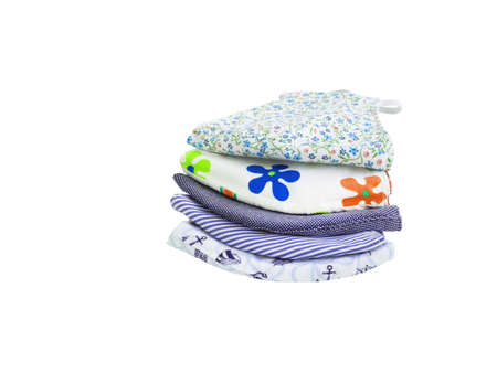 A pile of multi colored of fabric face mask isolated on a white background. Concept of coronavirus outbreak and pollution. New normalの写真素材