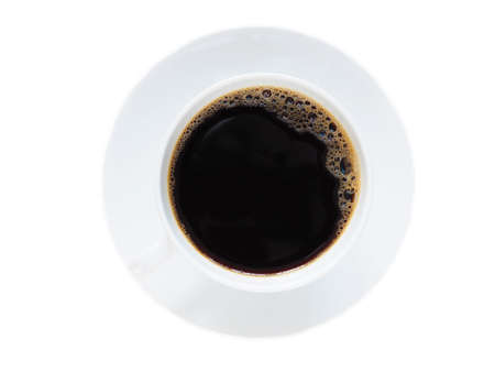 Top view of hot black coffee in a white mug with saucer isolated on a white background.