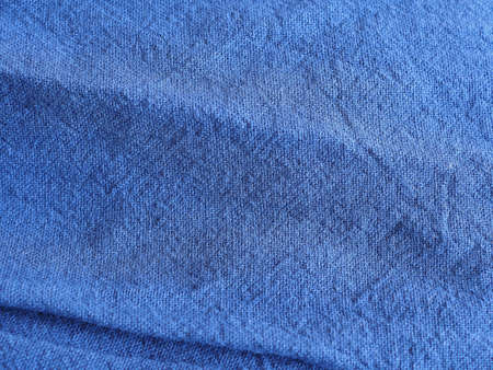 Background texture of fabric cotton linen blue color. Copy space for your text and design. Textile...