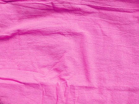 Background texture of fabric cotton linen pink color. Copy space for your text and design. Textile concept and soft backdrop, Flat layの写真素材