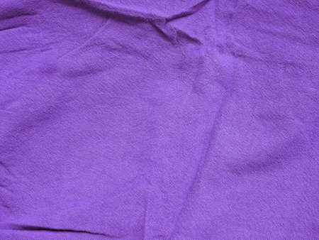 Background texture of fabric cotton linen purple color. Copy space for your text and design. Textile concept and soft backdrop, Flat layの写真素材