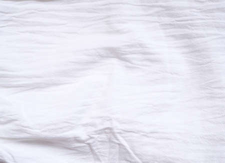 Background texture of fabric cotton linen white color. Copy space for your text and design. Textile concept and soft backdrop, Flat layの写真素材