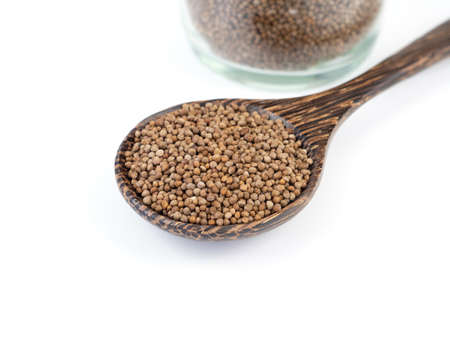 Close up, Perilla seed in wooden spoon isolated on a white background.  Healthy food.の写真素材