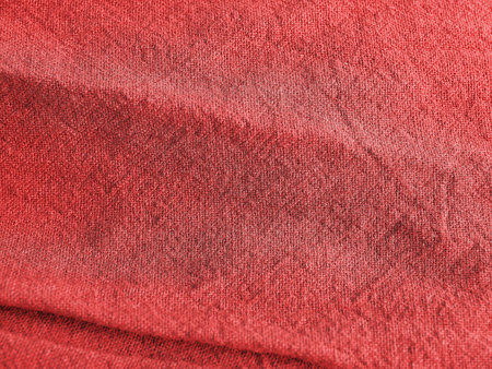 Background texture of fabric cotton linen red color. Copy space for your text and design. Textile concept and soft backdrop, Flat layの写真素材