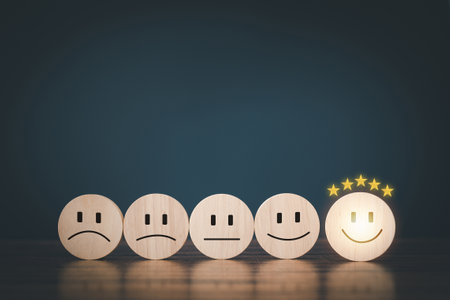 Customer services best excellent business rating experience.
Satisfaction survey concept. A smile face icon on wood block circle. 5 Star Satisfaction.の写真素材