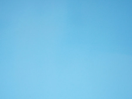 Empty deep blue colored background texture. Blank blue paper surface space for your image, text, art, design, and composition for banner, wallpaper, backdropの写真素材