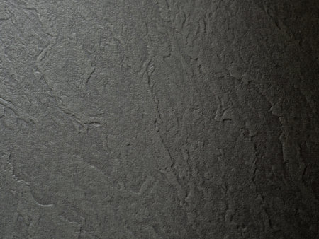 Empty black colored paper background texture, Concept for image, text, design.の写真素材