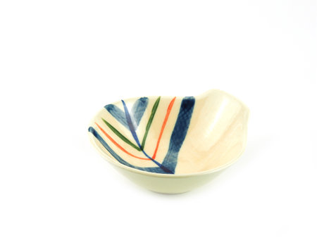 Empty old beige clay bowl with stripe isolated on a white background. Japanese style, Use for home or restaurant, food design. Kitchen accessory.の写真素材