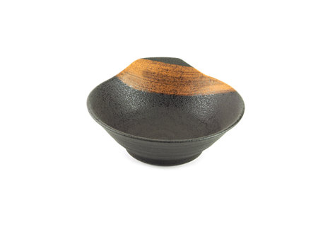 Empty old brown clay bowl with stripe isolated on a white background. Japanese style, Use for home or restaurant, food design. Kitchen accessory.の写真素材